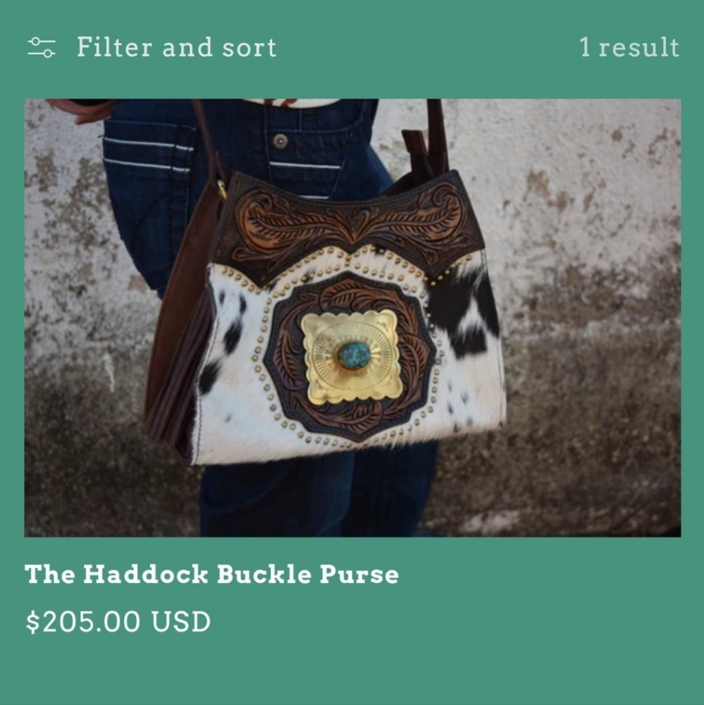 Haddock buckle purse cowhide